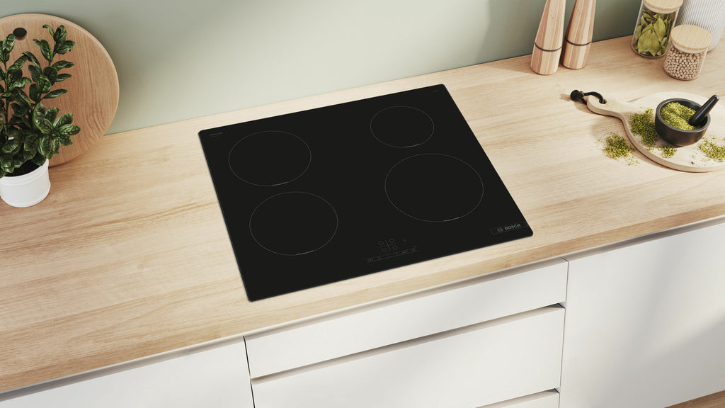 Bosch Bosch Serie 4 PUE611BB5E plaque Noir Intégré 60 cm Plaque avec zone à induction 4 zone(s)
