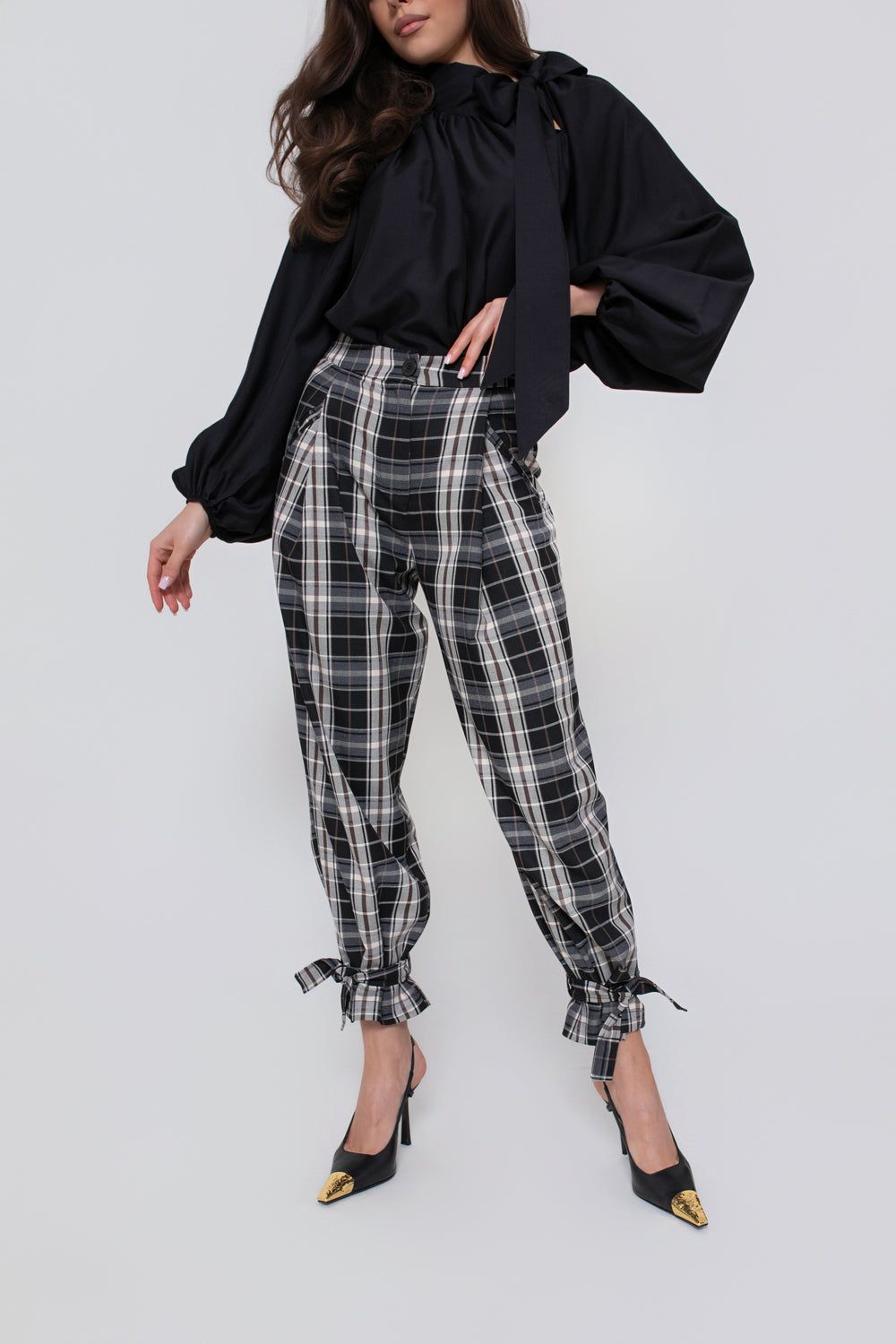 Pantalon à carreaux pour femme avec un pli