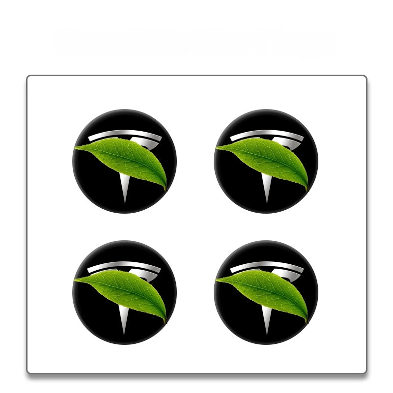 MOTENIO Caches centraux de roue avec logo Tesla argenté et noir - Lot de 4 pièces