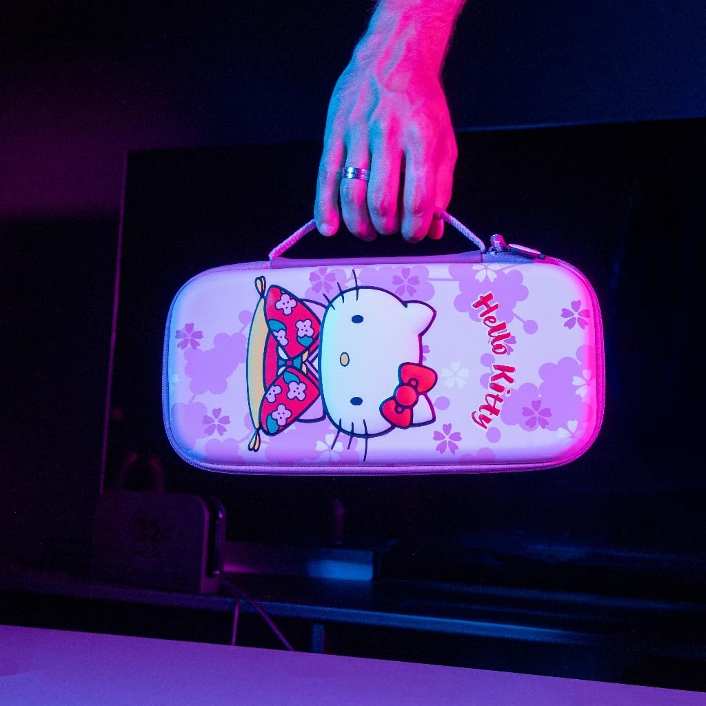 Konix Hello Kitty Housse de protection et transport console Nintendo Switch 2 - Filet rangement accessoires - 8 compartiments jeux - Motif 3D - Rose