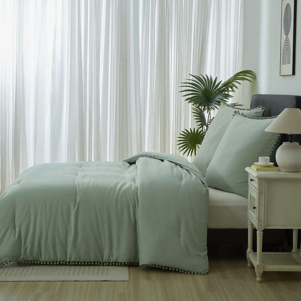 MEEALLHOME Parure de lit à pompons turquoise - 1 housse 200 x 200 cm et 2 taies 65 x 65 cm