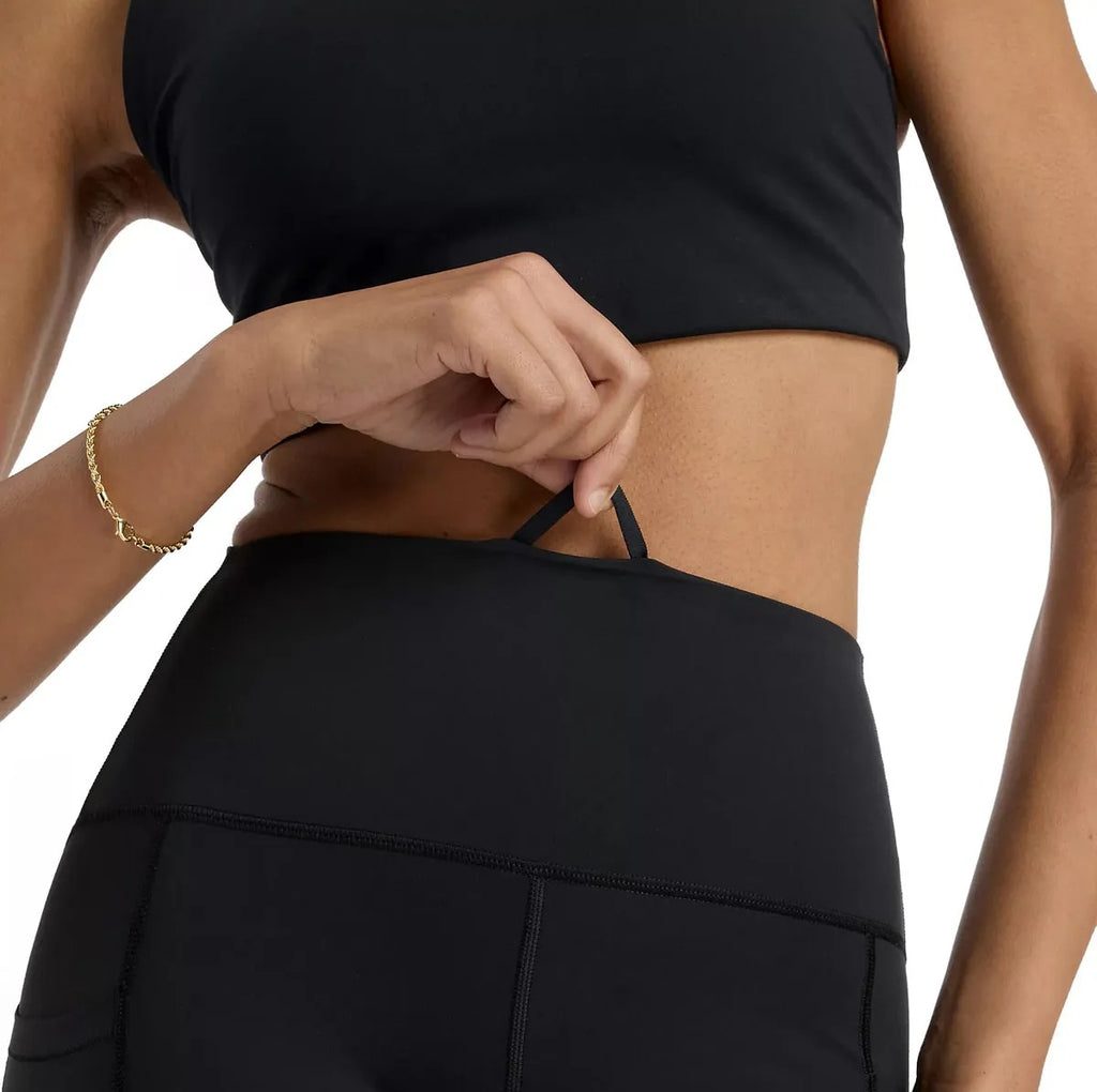 New Balance Legging taille haute à poche Noir