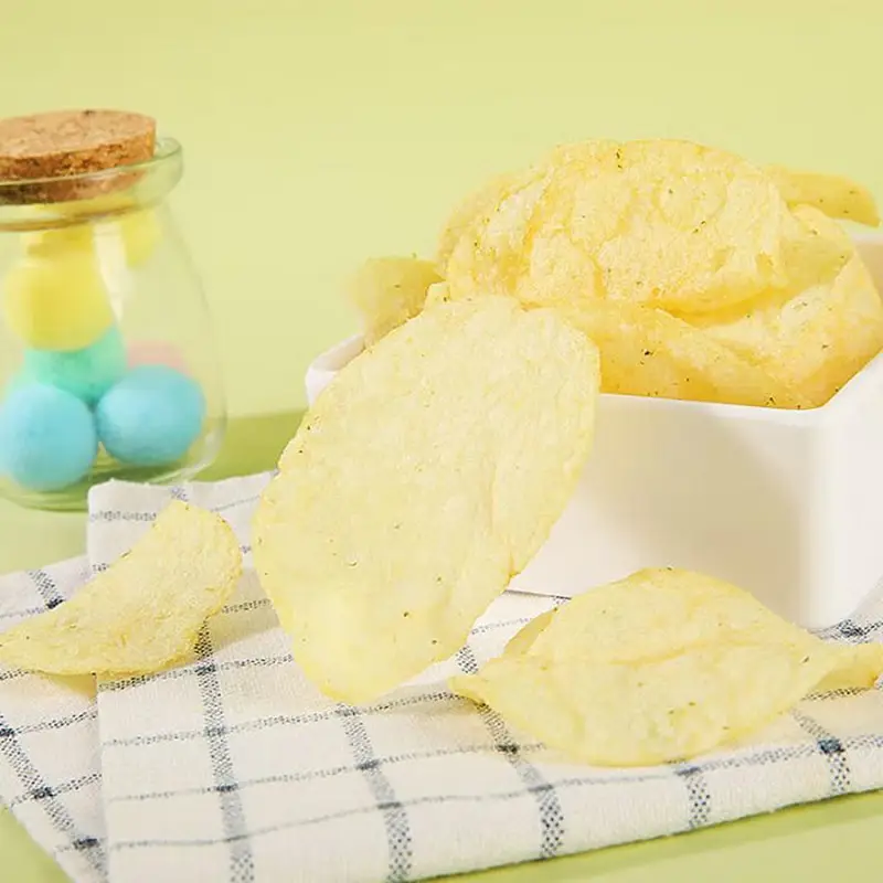 Lay's Chips saveur concombre - 70 g contient de l'édulcorant aspartame