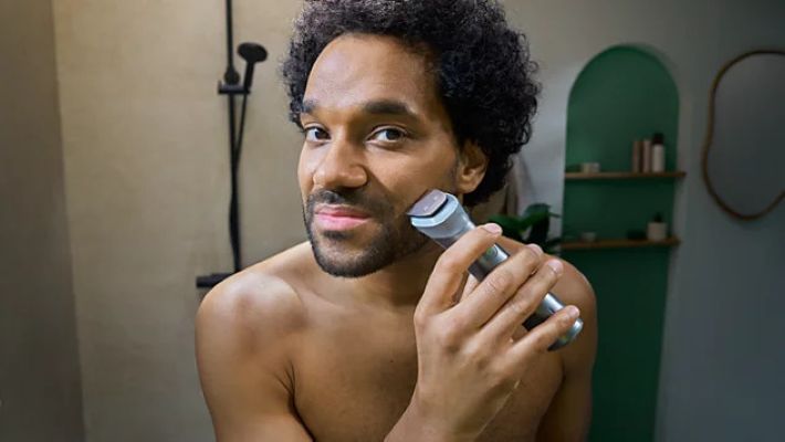 PHILIPS Series 5000 MG5941/15 - Tondeuse 11-en-1, visage + cheveux + corps, lames métalliques auto-affûtées, technologie BeardSense, 11 accessoires et 13 hauteurs de coupe (0,5 à 16 mm). Autonomie de 120 min, recharge USB, 100 % étanche, pochette sou