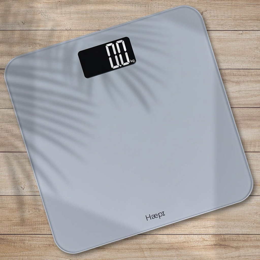 Haepi - Pèse-personne électronique avec grande plateforme et écran rétroéclairé - Capacité max. 180 kg - Piles incluses - Garantie 15 ans