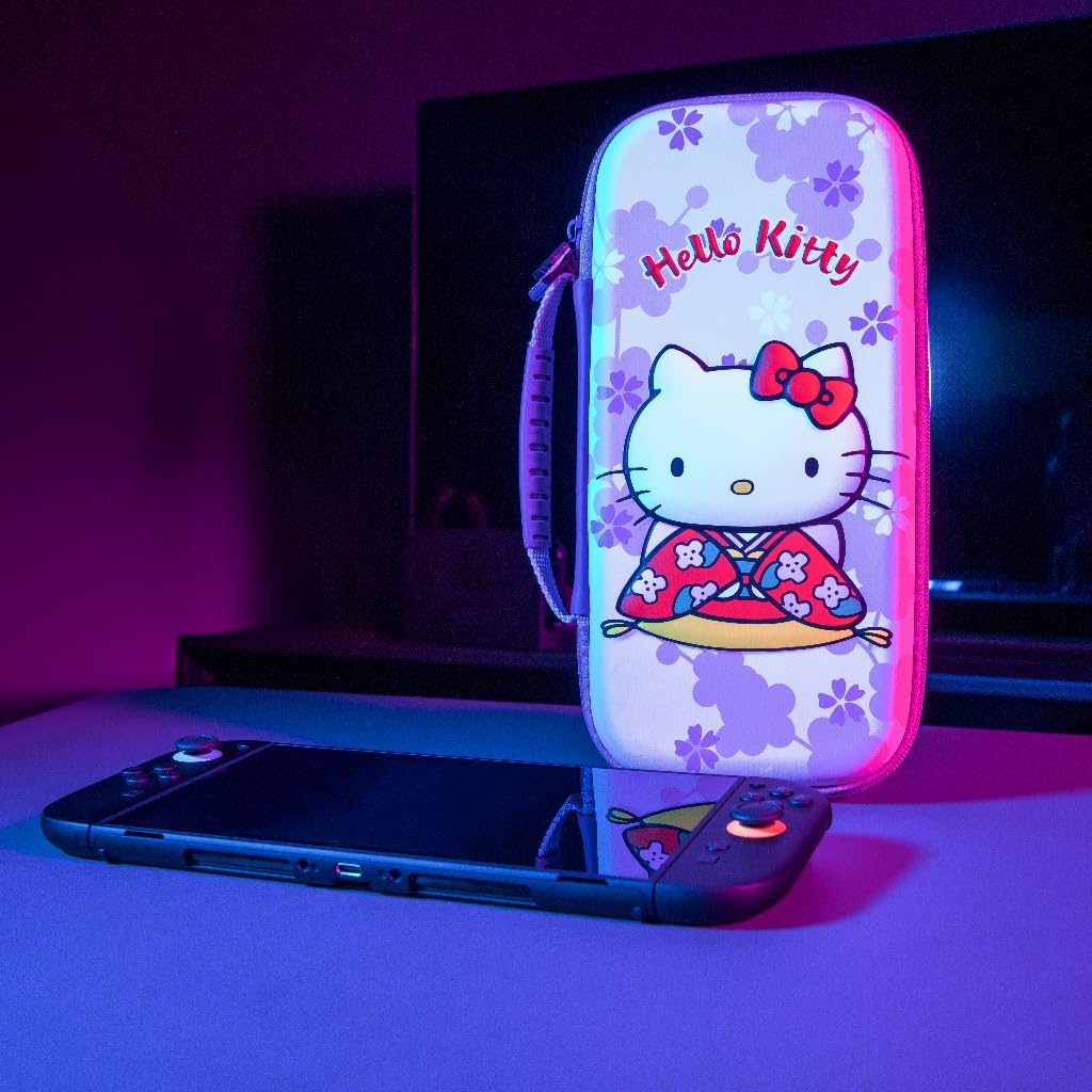 Konix Hello Kitty Housse de protection et transport console Nintendo Switch 2 - Filet rangement accessoires - 8 compartiments jeux - Motif 3D - Rose