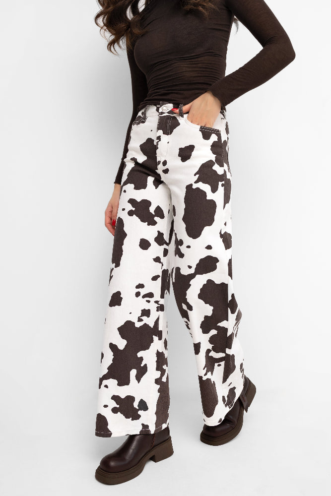 Pantalon à jambes larges, imprimé animalier écru avec des empiècements