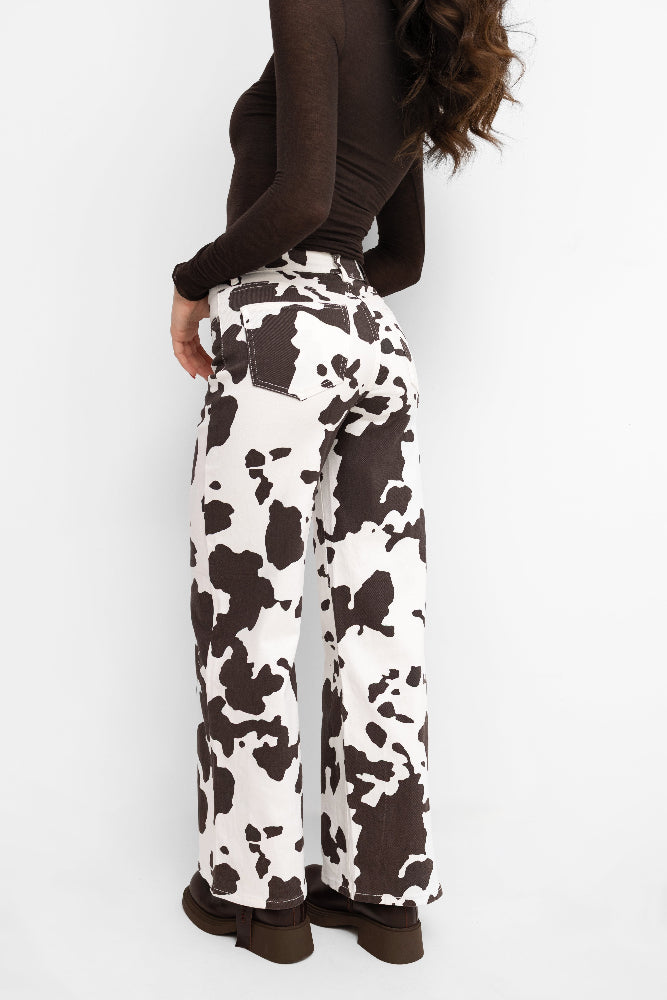 Pantalon à jambes larges, imprimé animalier écru avec des empiècements