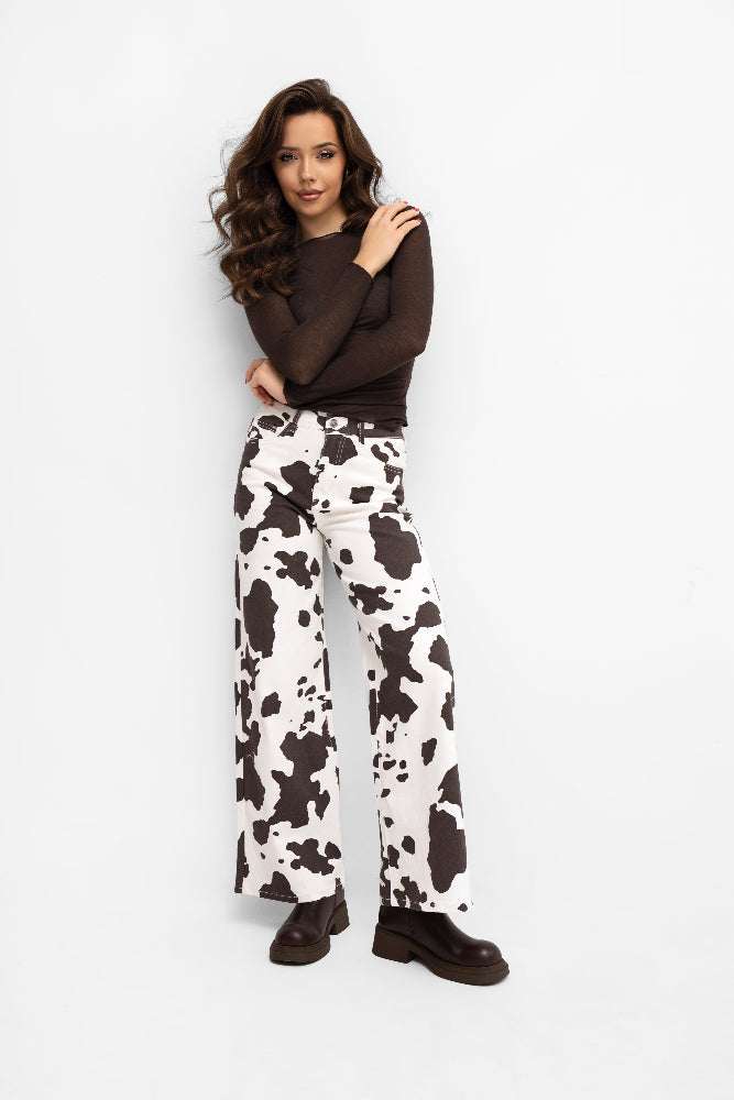 Pantalon à jambes larges, imprimé animalier écru avec des empiècements