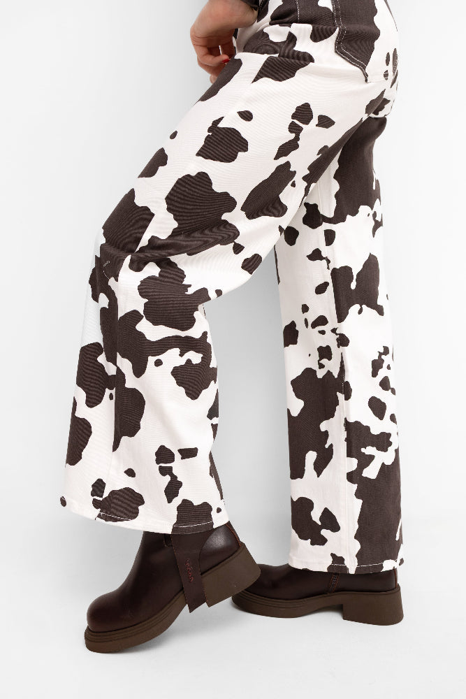 Pantalon à jambes larges, imprimé animalier écru avec des empiècements
