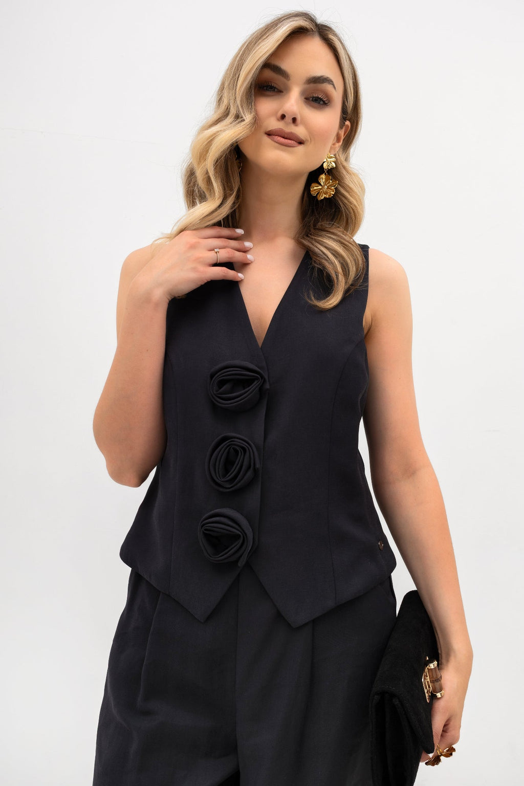 Gilet pour femme avec des boutons à motifs floraux - coupe élégante et ajustable