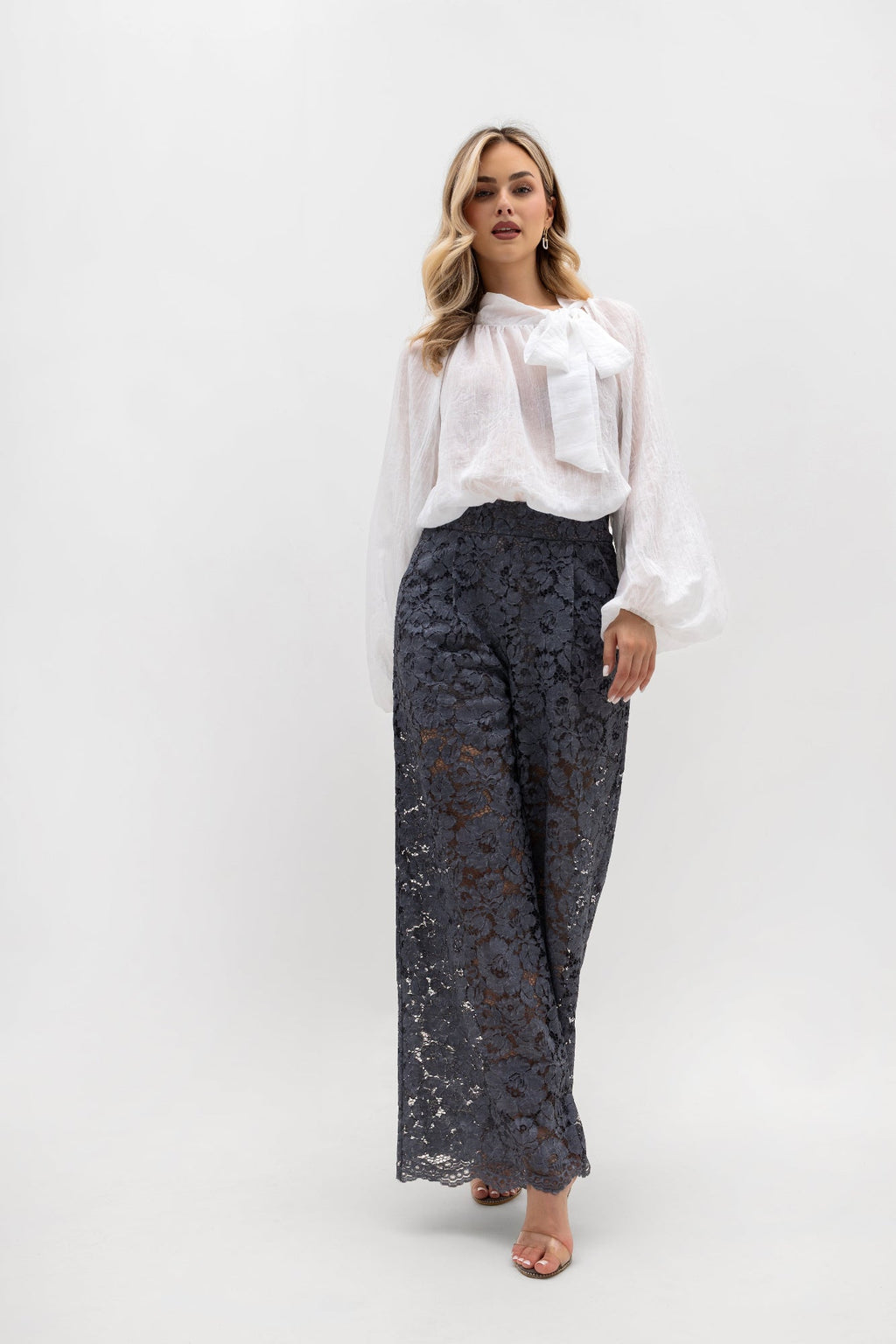 Pantalon ample en dentelle, avec poches et taille élastiquée