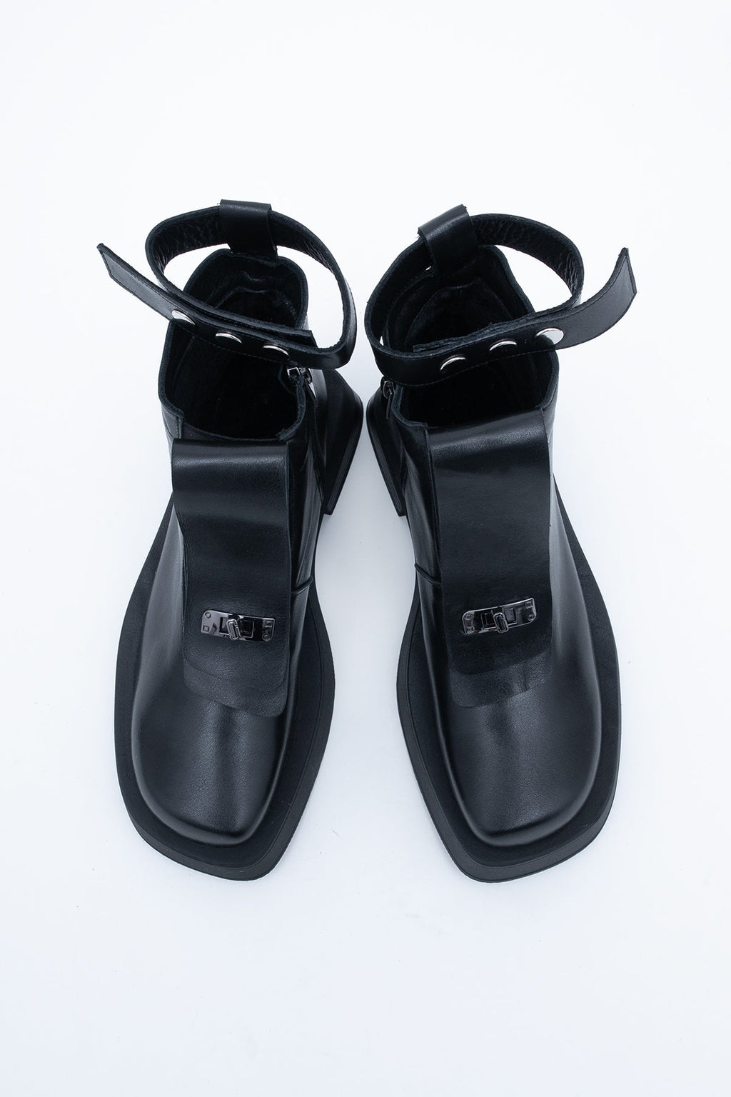 Bottines en cuir avec lanière décorative 2 en 1