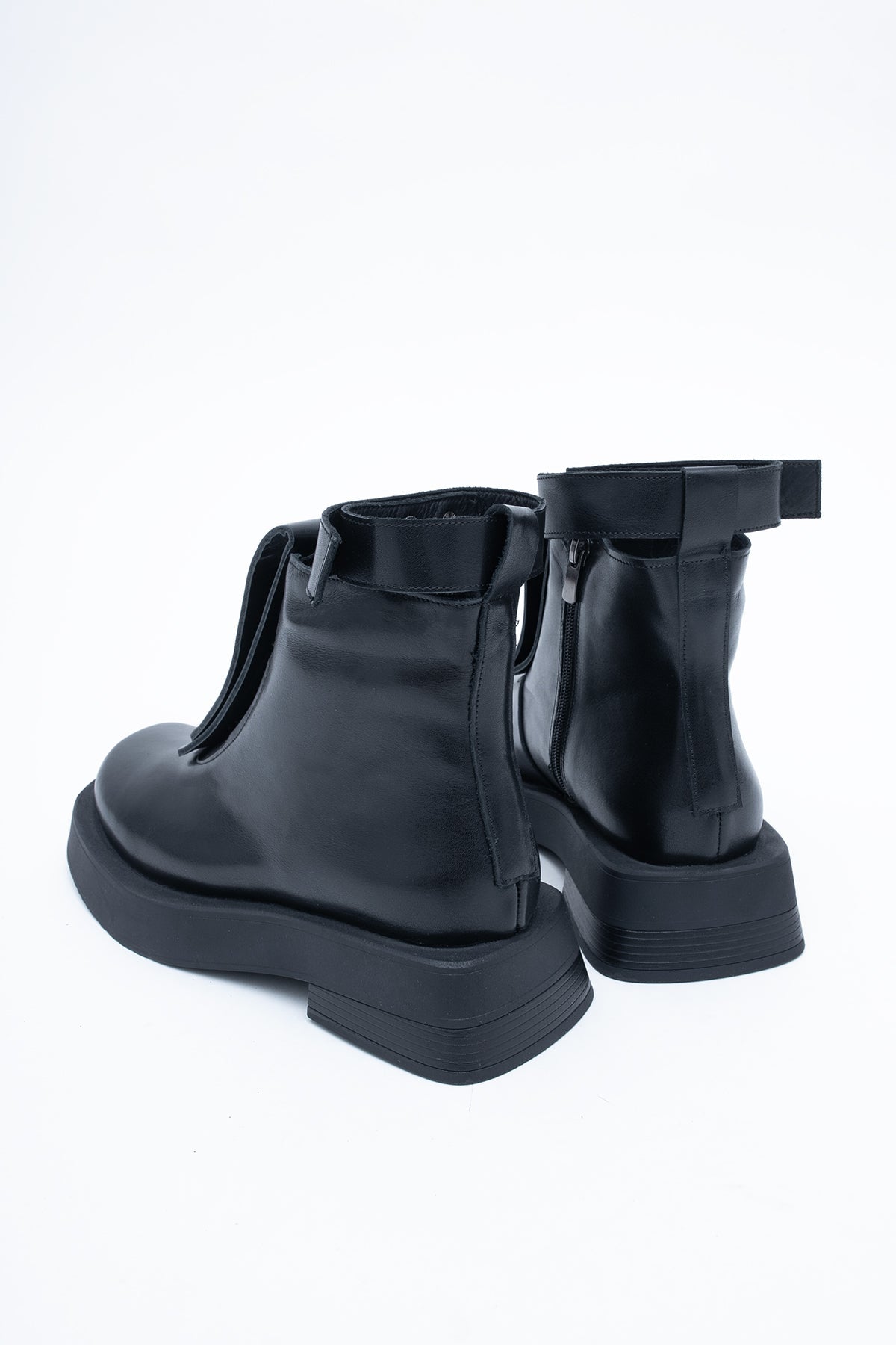 Bottines en cuir avec lanière décorative 2 en 1