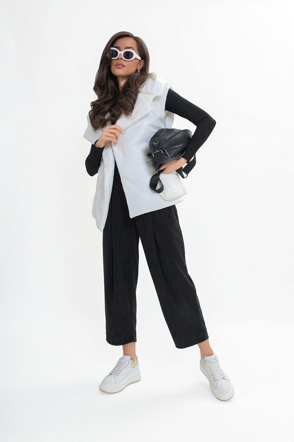 Gilet matelassé pour femme avec capuche et ceinture